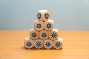 Dice pyramid with virus and protection symbol
