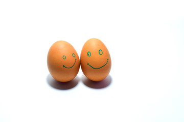 Eggs, smiling faces on a white background