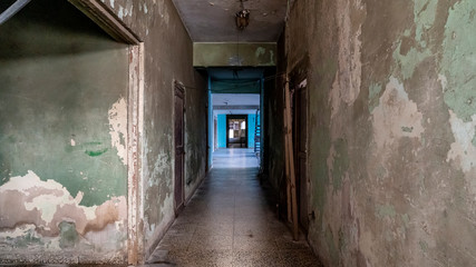 Obraz premium Abandoned and ruined residential building.