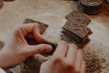 Making pieces of clay