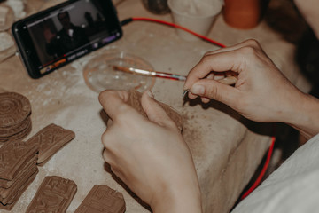 Making pieces of clay