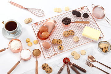 A cookie is a baked or cooked food that is typically small, flat and sweet. It usually contains flour, sugar and some type of oil or fat. 