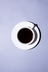 Cup of coffee with hard light
