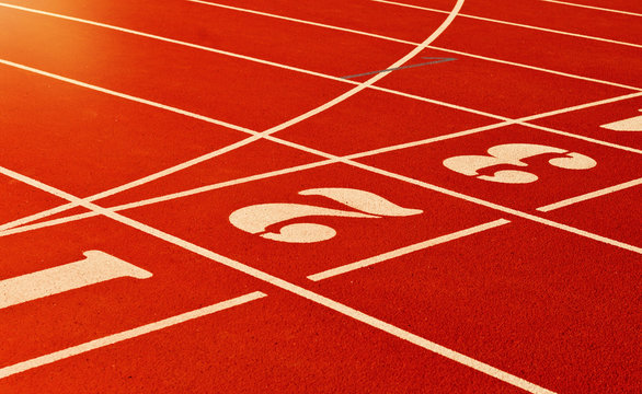 Stadium running track with red coating and numbers closeup © splitov27