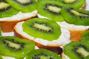 Sandwiches with kiwi. bread with fruit slices. background with food