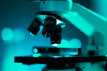 Close-up of scientific microscope. Laboratory in hospital. Epidemic disease, healthcare, vaccine research and coronavirus covid-19 test.