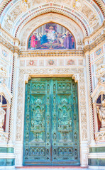 Gates of Santa Maria del Fiore - Famous cathedral church of Florence Cathedral (Duomo - Basilica di Santa Maria del Fiore) Florence, italy