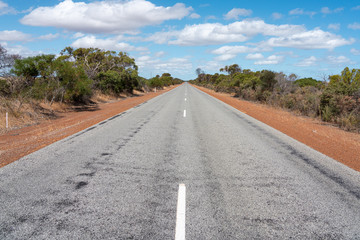 Fototapeta premium Empty straight road in the sun