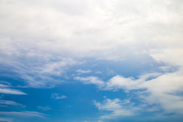White clouds in blue sky in summer day.