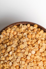 pigeon pea also known as toor dal in wooden bowl.