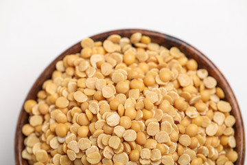 pigeon pea also known as toor dal in wooden bowl.