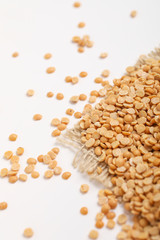 pigeon pea also known as toor dal on white background