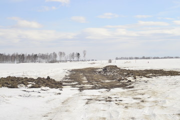 winter landscape with clay road