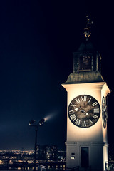 Clock tower at night on Novi Sad fortress. Same fortress where music festival Exit is performed.