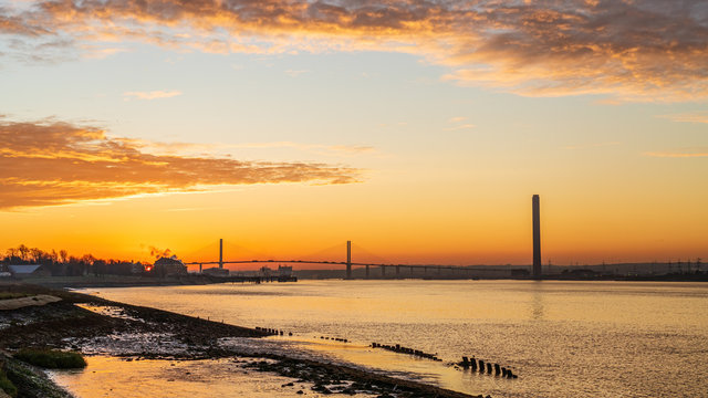 The River Thames leading towards The Queen Elizabeth II bridge, early morning, near Dartford, Suf