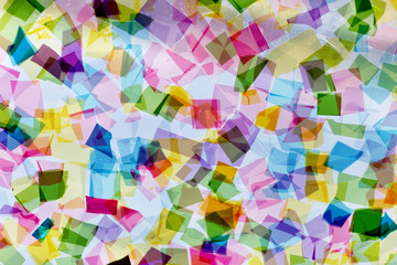 Abstract background of colourful squares of translucent material