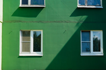 house with windows and sun