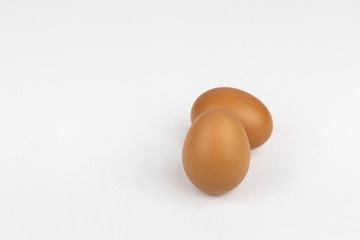 Raw chicken egg isolated on white background, space for text.