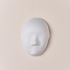 white paper mache mask, top view