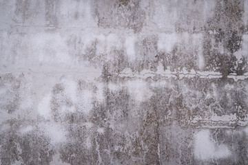 Fototapeta premium Texture of gray concrete wall surface. Some crack and scratch, suitable for use as a pattern or background image.