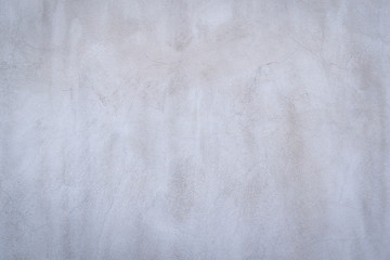 Texture of gray concrete wall surface. Some crack and scratch, suitable for use as a pattern or  background image.
