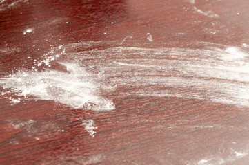 abstract background with flour scattered on a table