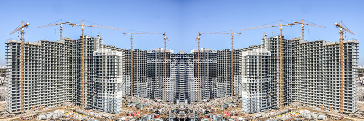 	Construction of new residential buildings against the sky . The concept of the construction business .