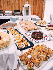 Candy bar. Table with sweets, candies, dessert