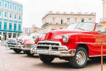 View of yellow classic vintage car in Old Havana, Cuba