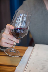 man is drinking the wine