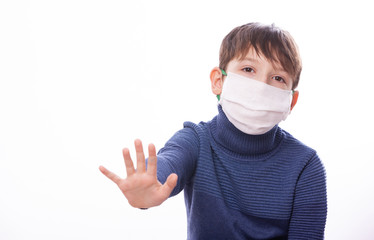A child in a medical mask during the coronovirus in the world.