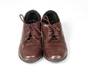 Women's leather shoes on a white background.