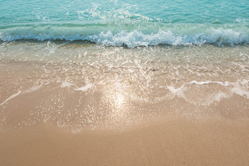 Blue ocean waves Sunlight Reflection Sand Beach background