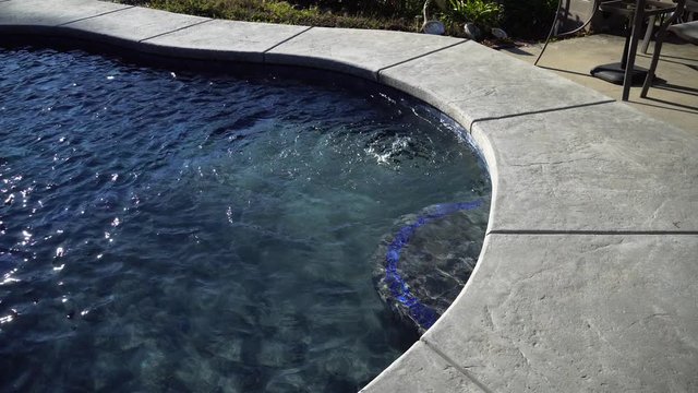 swimming pool heater pumping water out a jet