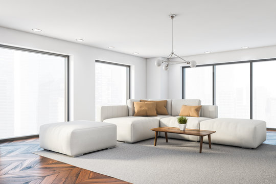 Panoramic white living room corner with sofa