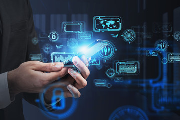 Man hands with smartphone in office, HUD interface