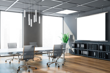 Grey conference room interior with poster