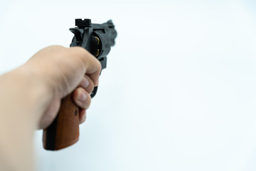 Naklejka premium Model gun shot on white background