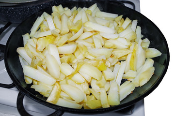  potatoes on the iron frying pan