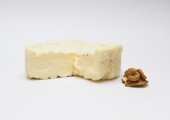 French-veined cheese from the Normandy region on a white background close