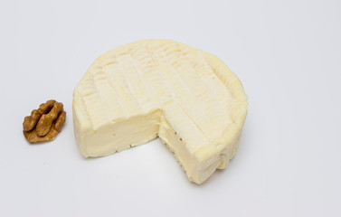French-veined cheese from the Normandy region on a white background close