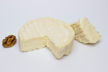 French-veined cheese from the Normandy region on a white background close