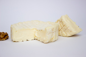 French-veined cheese from the Normandy region on a white background close
