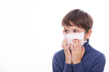 A child in a medical mask during the coronovirus in the world.