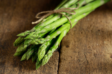 Asparagus.  Fresh Asparagus on wooden background