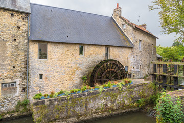 Bayeux, France. Dam and old mill with a water wheel on the Aure river © Valery Rokhin