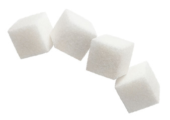 Flying sugar cubes, isolated on white background