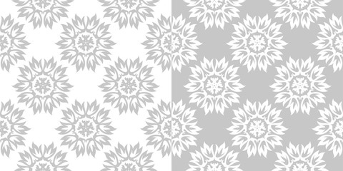 Compilation of gray and white floral patterns. Set of seamless backgrounds