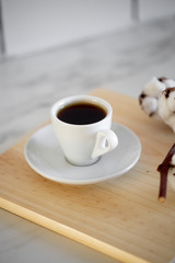Coffee cup on wooden background
