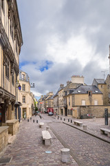 Fototapeta na wymiar Bayeux, France. Bienvenu street in the old town
